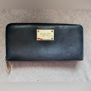 Michael Kors Black Zippy Wallet with gold hardware